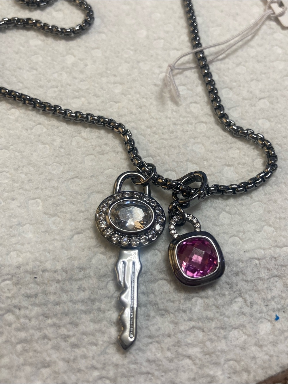 Silver-Key Pendant Necklace with Pink Gem Accent